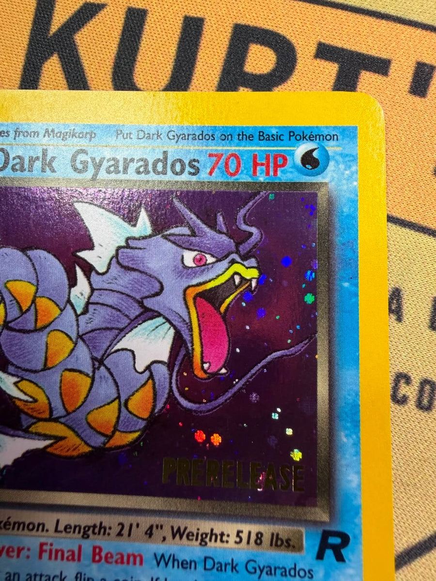 The same Dark Gyarados holo card after cleaning, the holo pattern sharp and the surface clear
