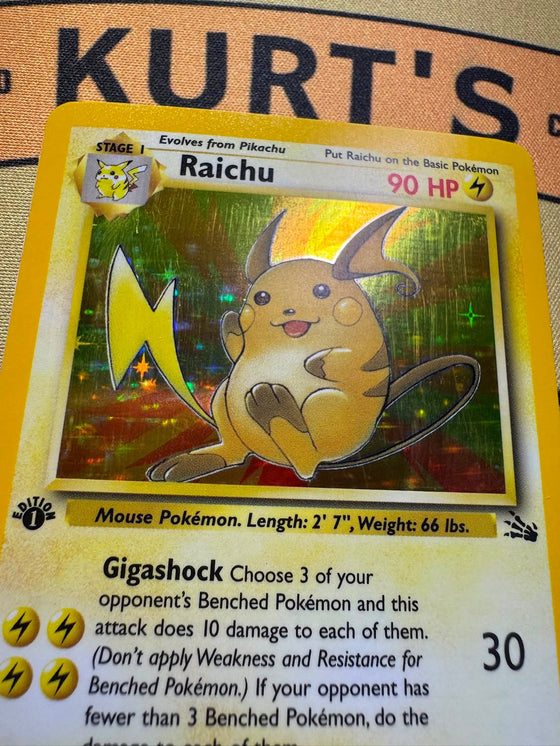 A trading card before treatment, its surface clouded with haze